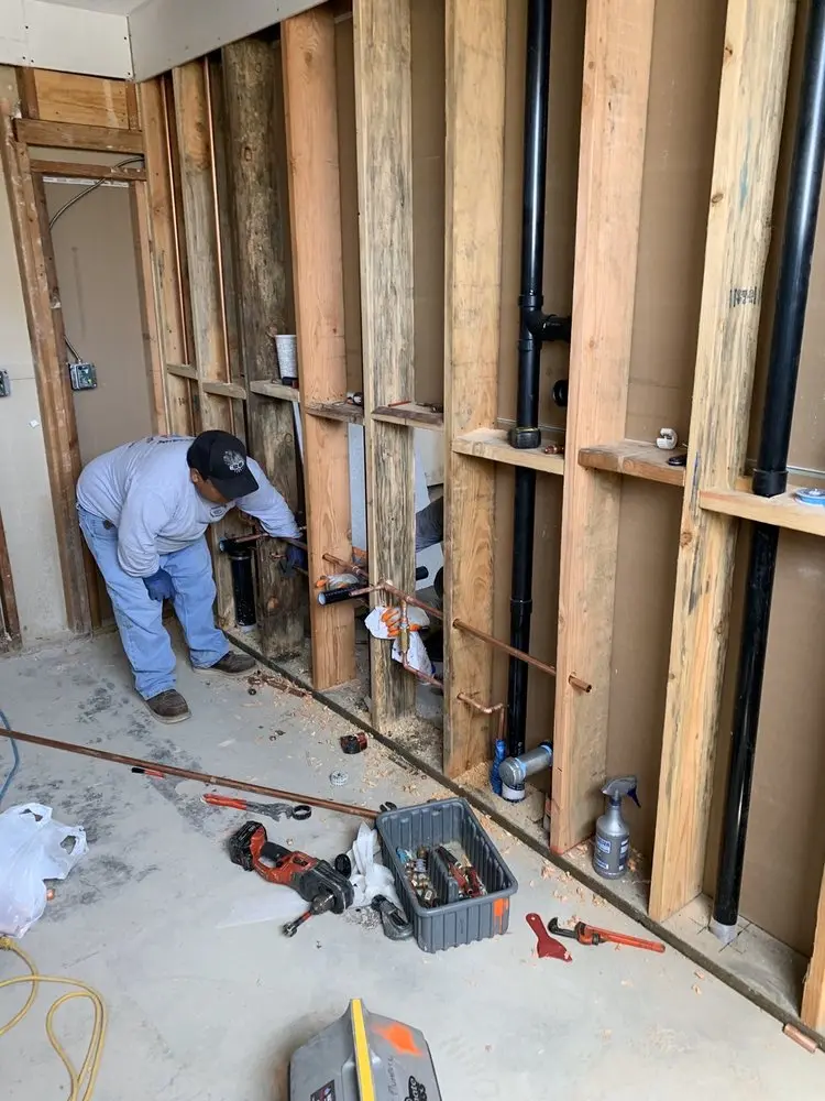 Commercial rough-in plumbing for Water Heater Replacement in Franklin - Randolph